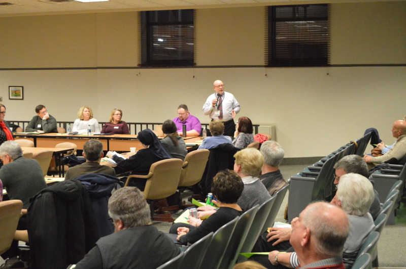 Office of Worship Administrator Matthew Clark addresses participants at one of the 